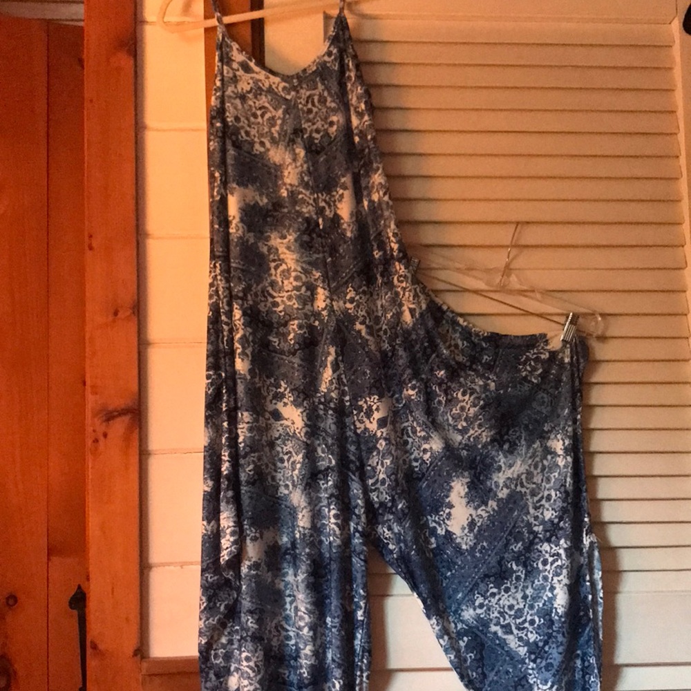 India Boutique blue and white floral/Moroccan print jumpsuit. One size fits all